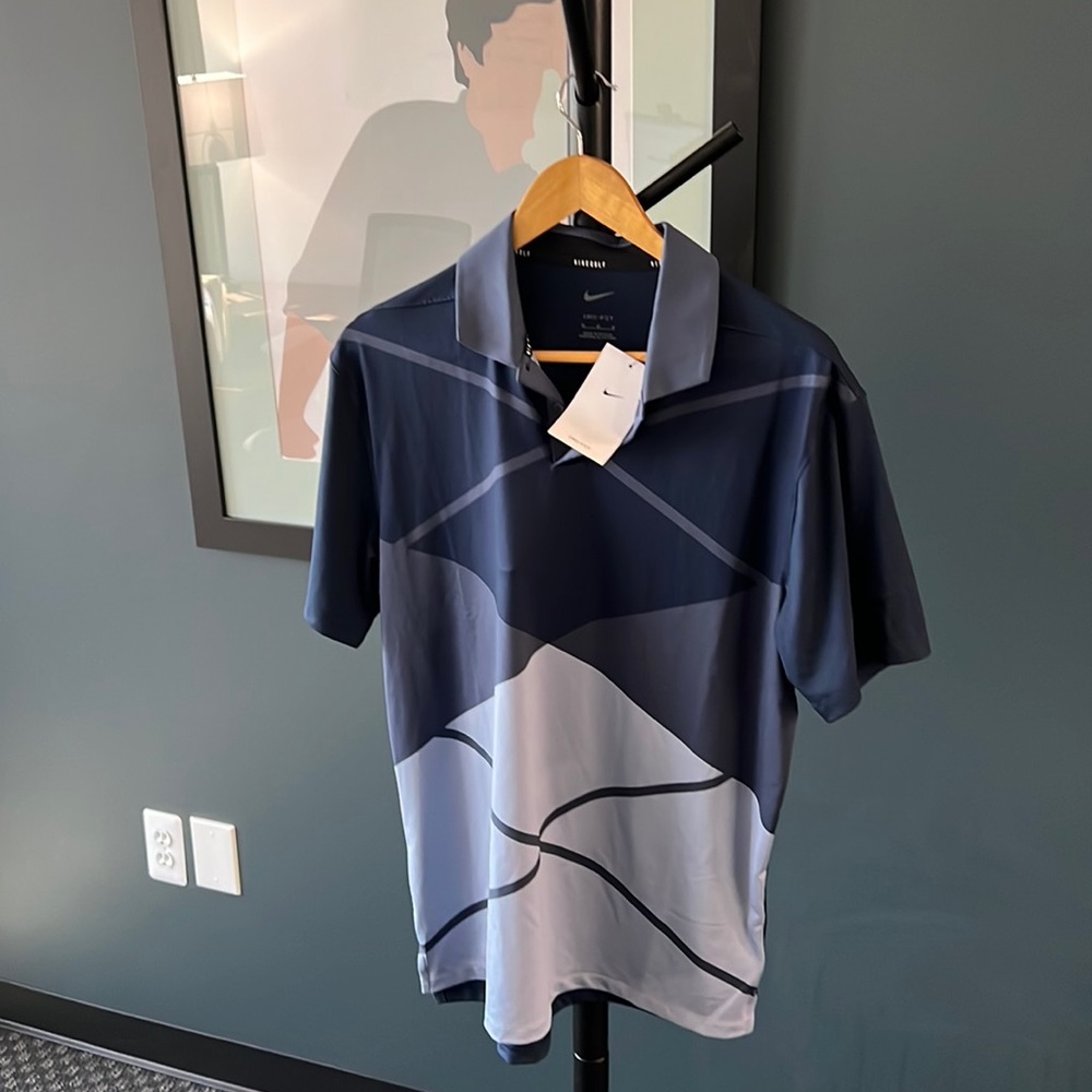New with tags. Nike dri-fit golf shirt.